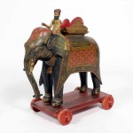 Large Painted Elephant and Rider on Wheeled Base
