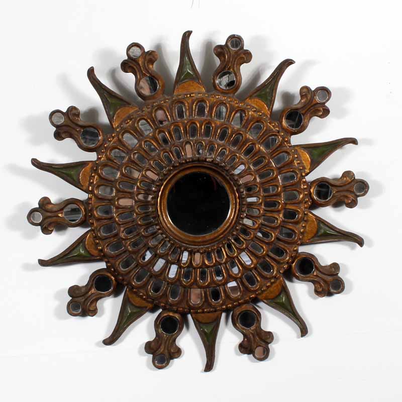 A Stunning Carved, Gilt and Painted Sunburst Mirror