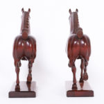 Two Peter Giba Horse Carvings