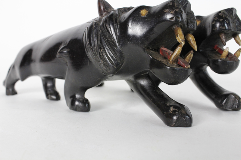 Pair of Carved Ebony Anglo Indian Lions