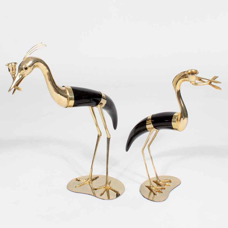 A Pair of Faux Horn and Metal Heron Form Candlesticks