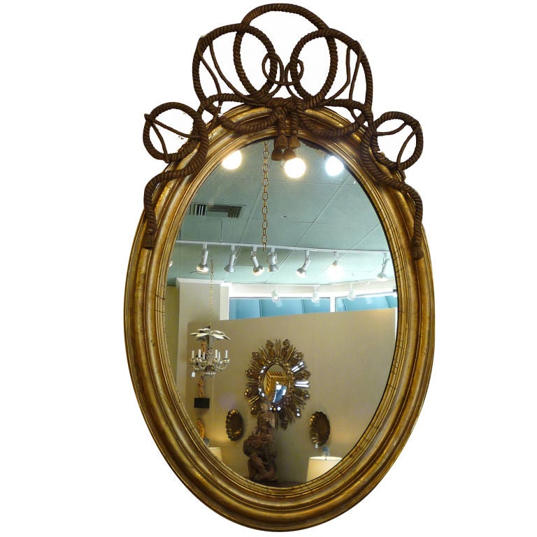 A Large Oval English Rope Twist Carved and Gilt Mirror