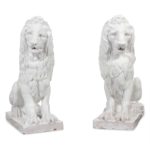 Facing Pair of Regal Majolica Lion Figures