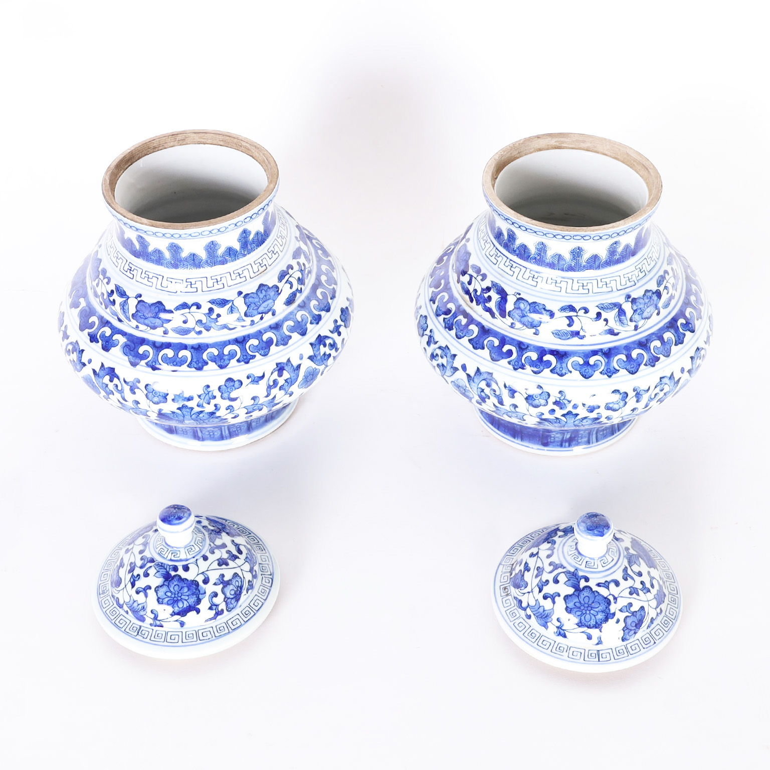 Pair of Chinese Blue and White Porcelain Lidded Urns