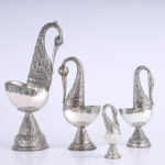 Group of Four Anglo Indian Seashell and Metal Swans