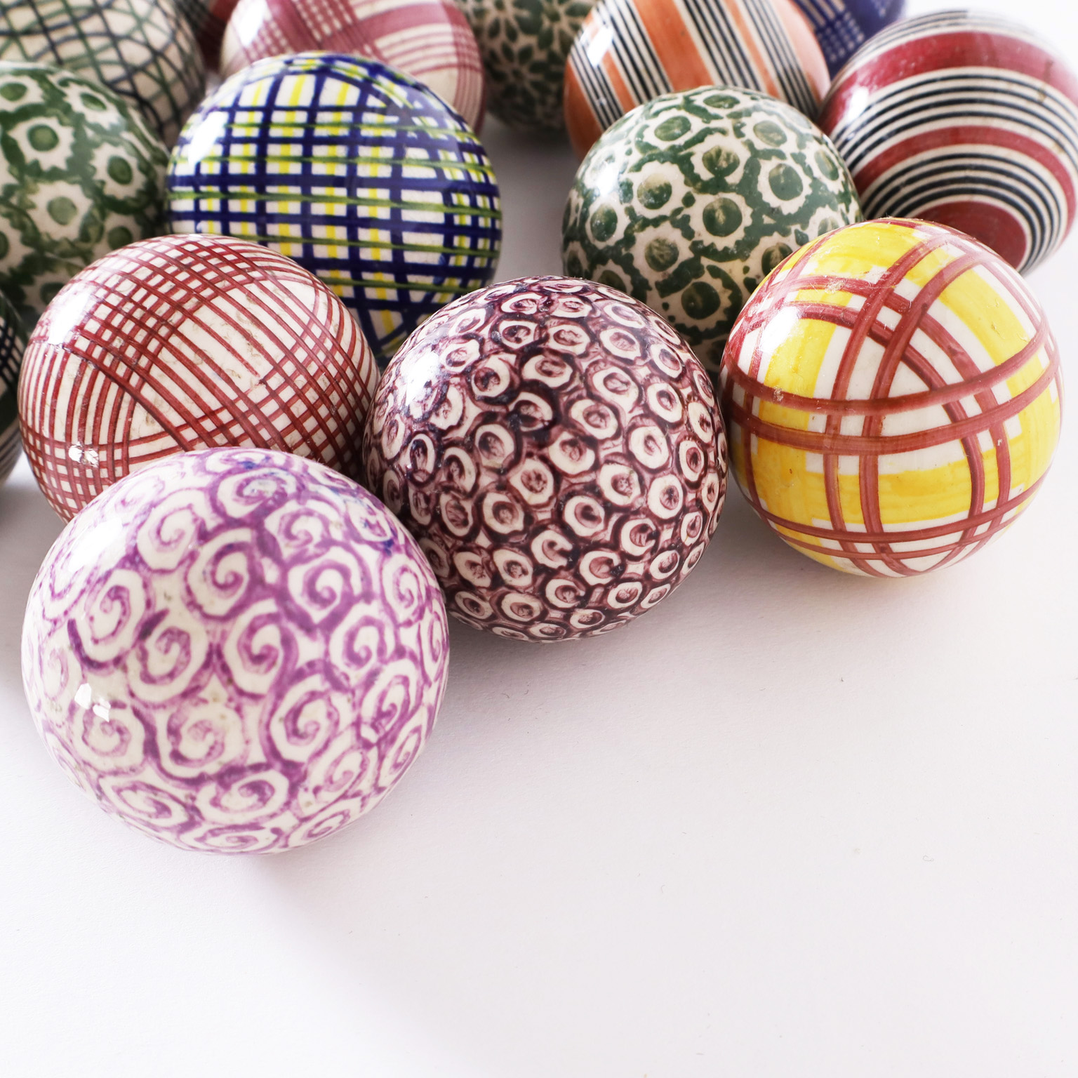 Thirteen Antique Glazed English Stoneware Carpet Balls, Priced Individually