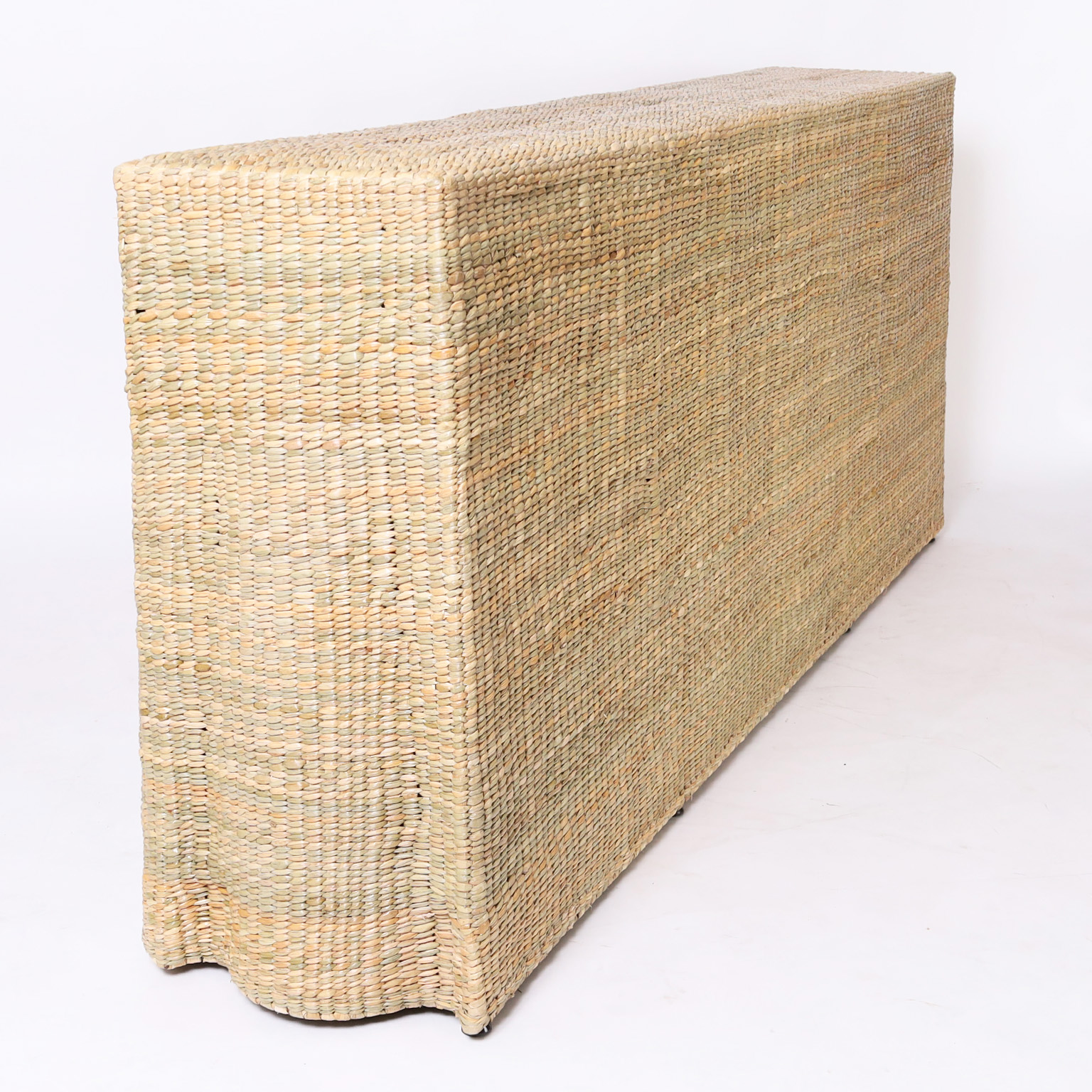 The Bali Long Woven Reed Ghost Drapery Console with Flat Back from the FS Flores Collection