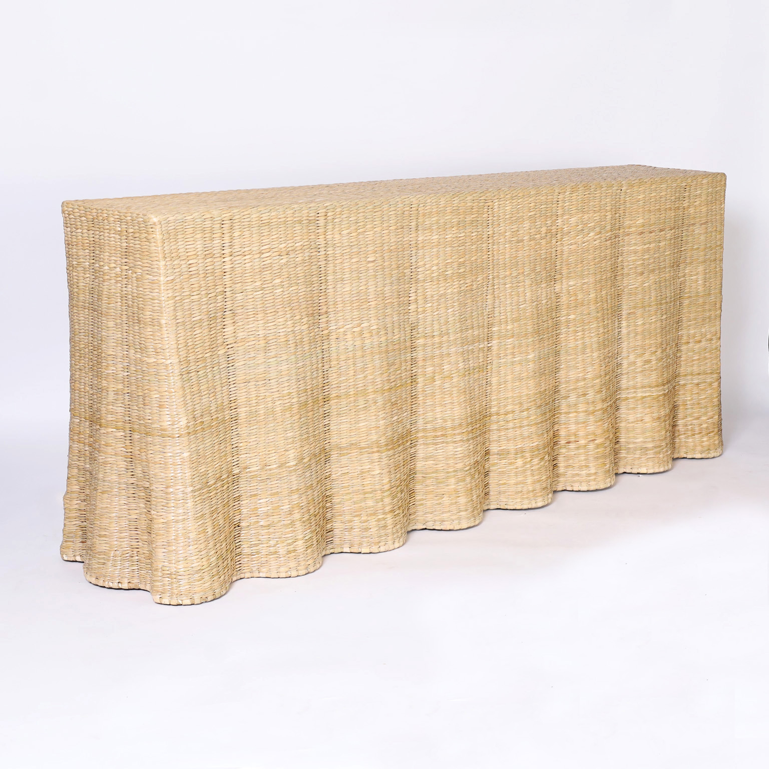 The Bora Bora Long Wicker Drapery Ghost Console from the FS Flores Collection