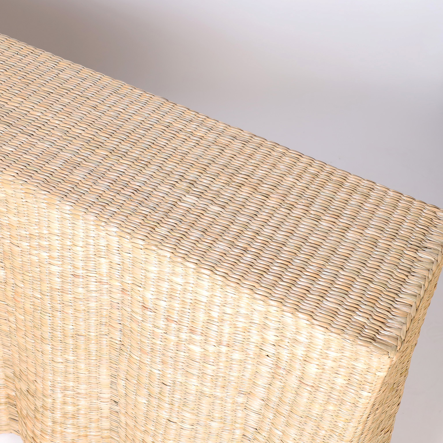 The Bora Bora Long Wicker Drapery Ghost Console from the FS Flores Collection