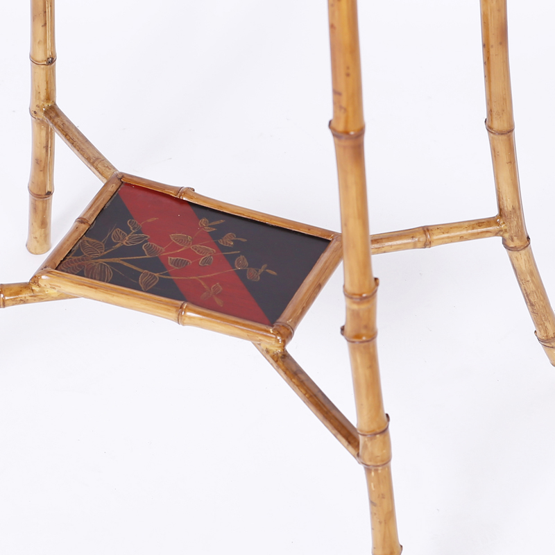 Pair of British Colonial Style Bamboo Stands with Red and Black Motif