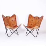 Pair of Mid Century Anglo Indian Embossed Leather Sling Chairs