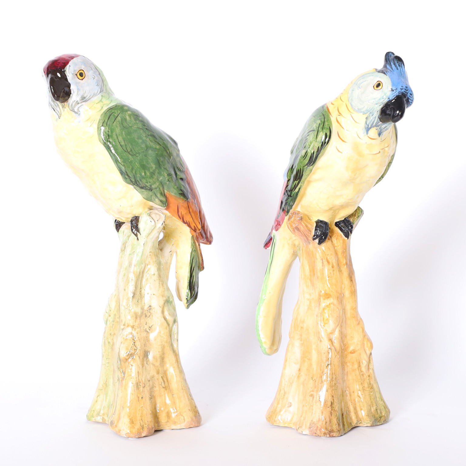 Lofty Pair of Glazed Earthenware Parrots