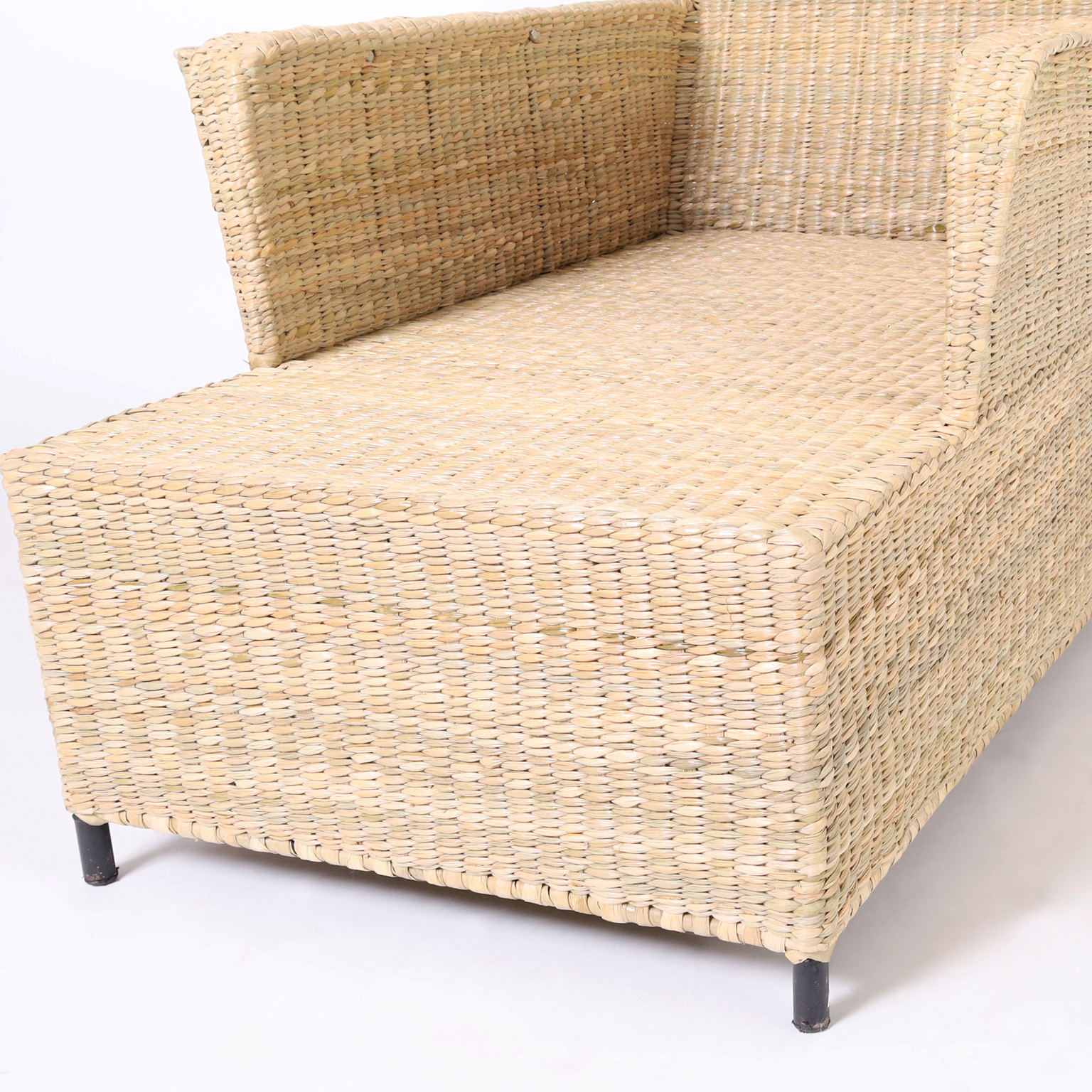 The Palm Beach Woven Reed Chaise Lounges with Magazine Racks from the FS Flores Collection