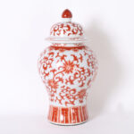 Pair of Chinese Red and White Porcelain Lidded Urns or Jars