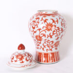Pair of Chinese Red and White Porcelain Lidded Urns or Jars