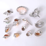 Group of Thirteen Silver Plate Seashells