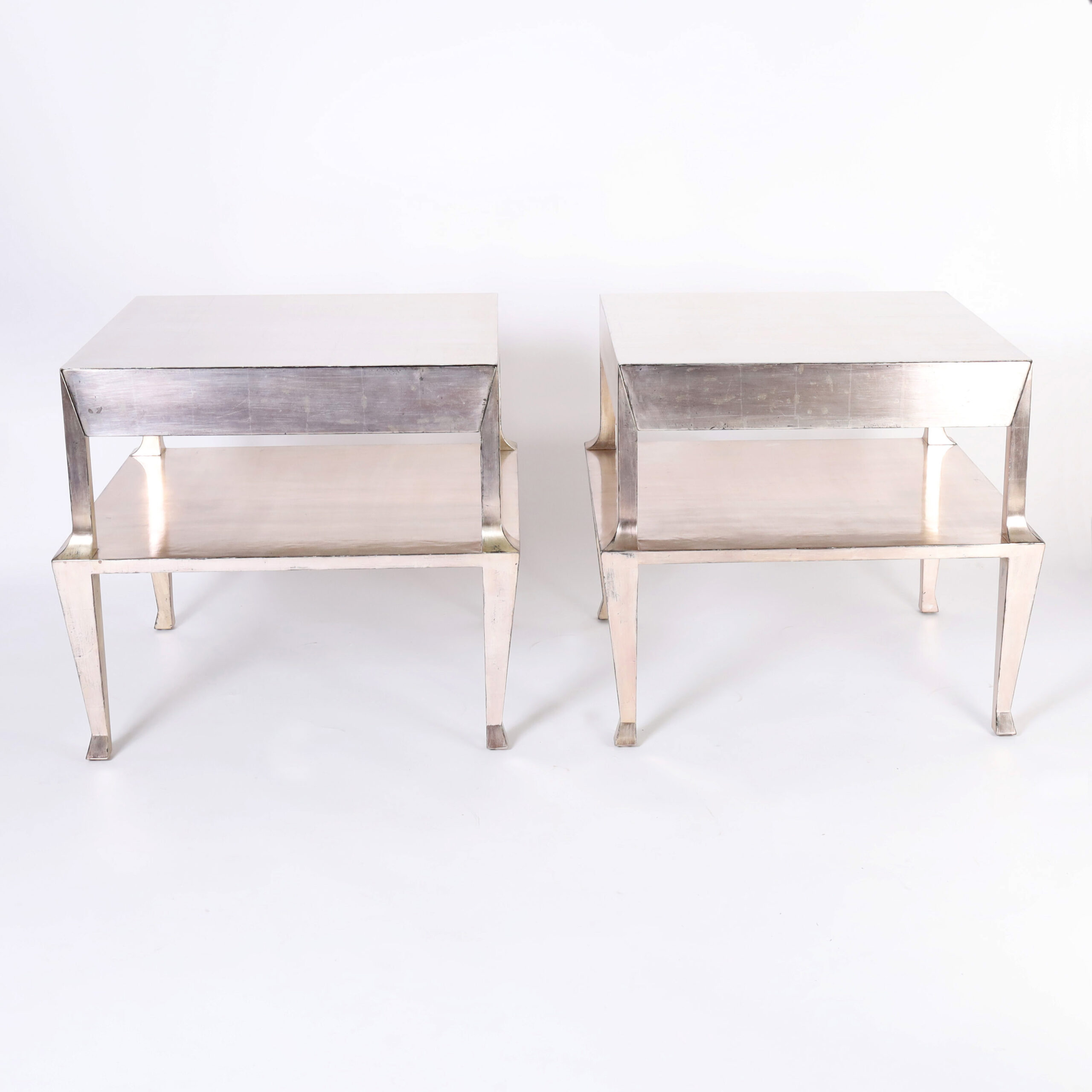 Pair of Mid Century Silver Leaf Two Tiered Stands or Tables
