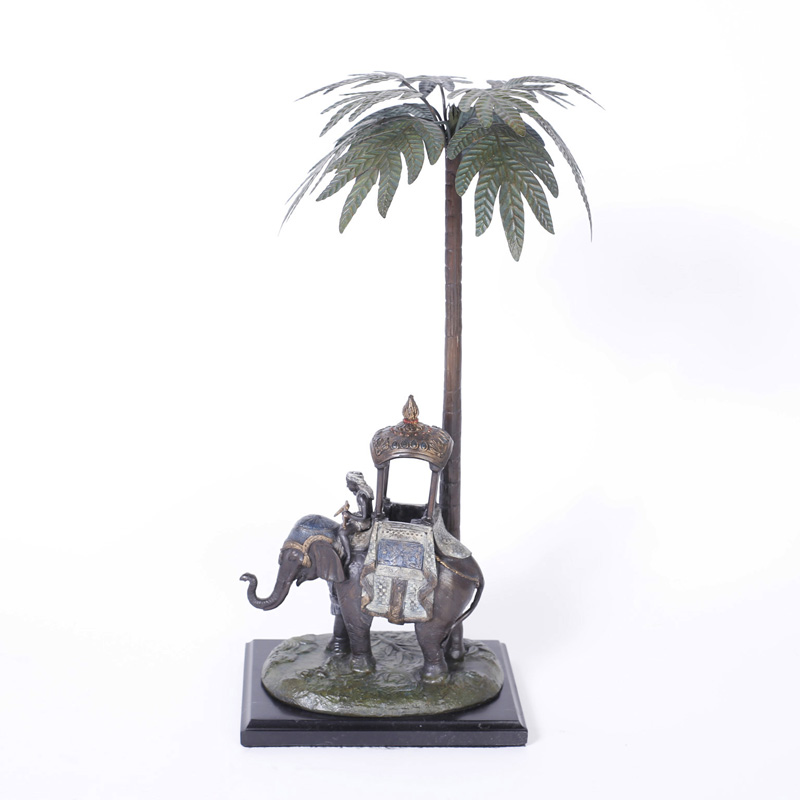 Metal Sculpture of an Elephant & Rider under a Palm Tree