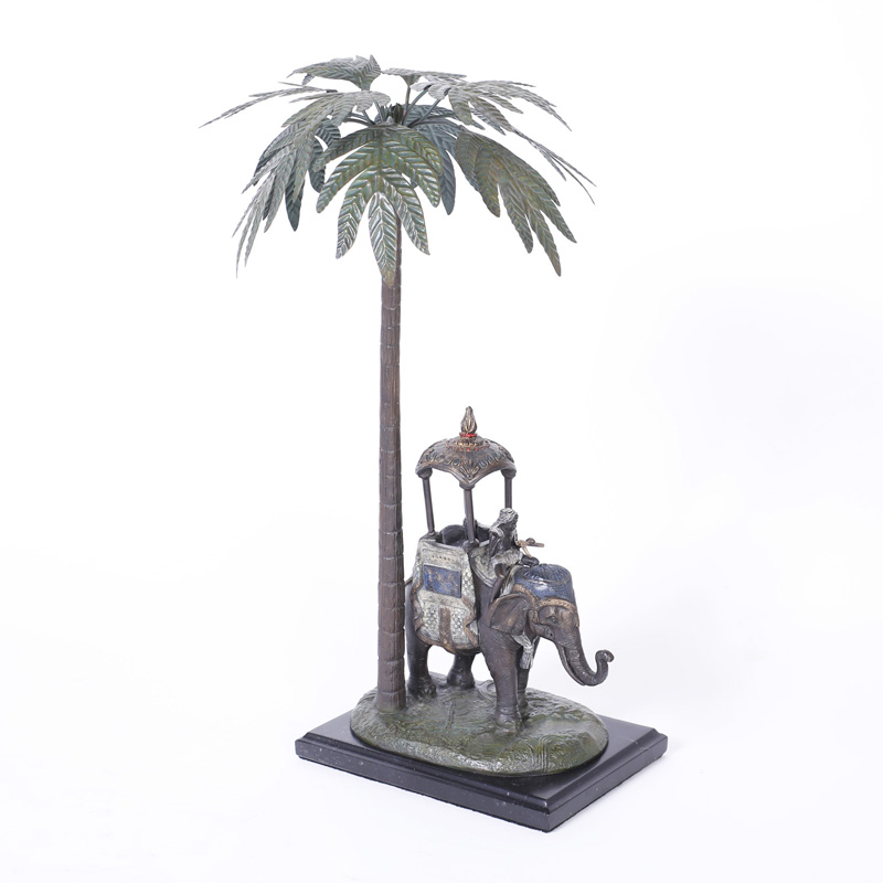Metal Sculpture of an Elephant & Rider under a Palm Tree